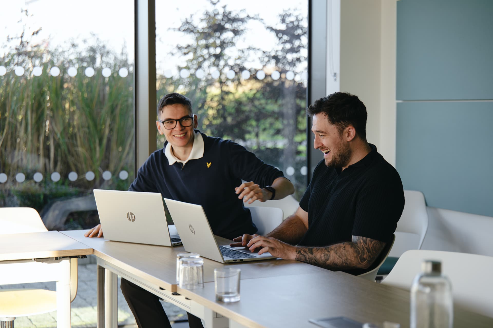 Cyber Trust team laughing in the office